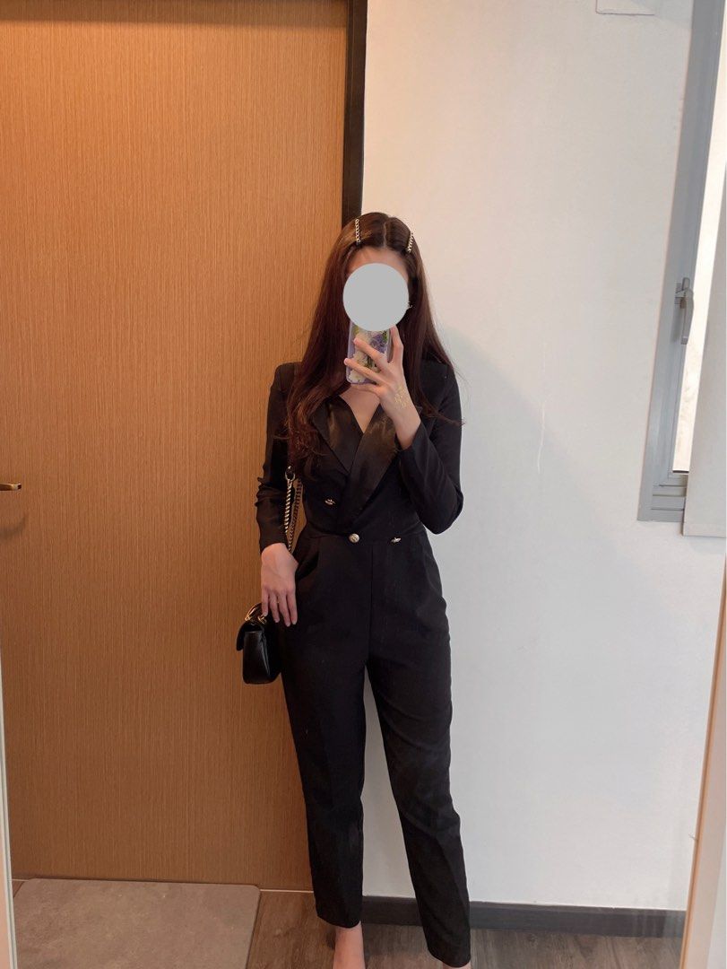 Black jumpsuit with gold buttons top