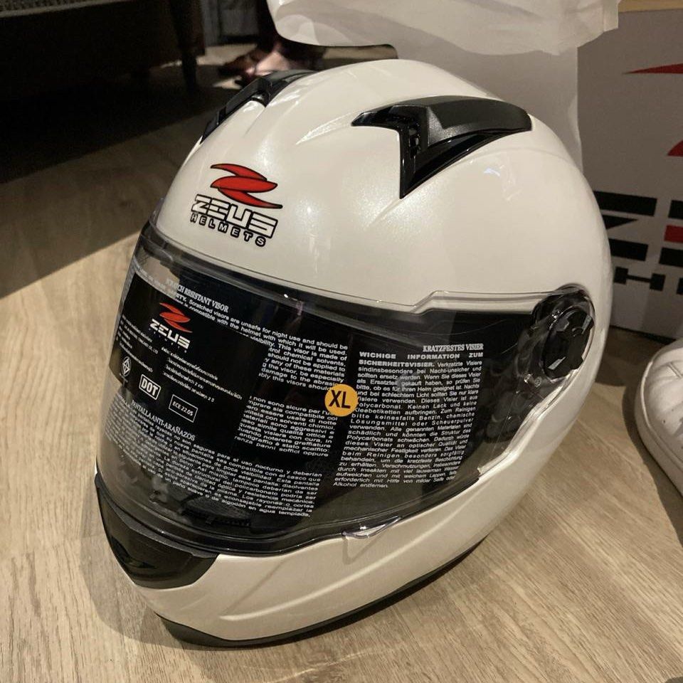 [BNWT] Zeus Full Face Helmet with Helmet Bag (Category: Motorcycle Accessories) located in Singapore. Submitted by hotramen (Listing ID 1281161107, Image 1). Description: Selling this as it’s too big for my head 😅 Helmet is in Pearl White colour, size XL! Will come with helmet bag. Two air vents at the top and one at the front of the helmet. Brand-new. Never used at all. No weird odours and no stains. Check photos for more details and specificat
