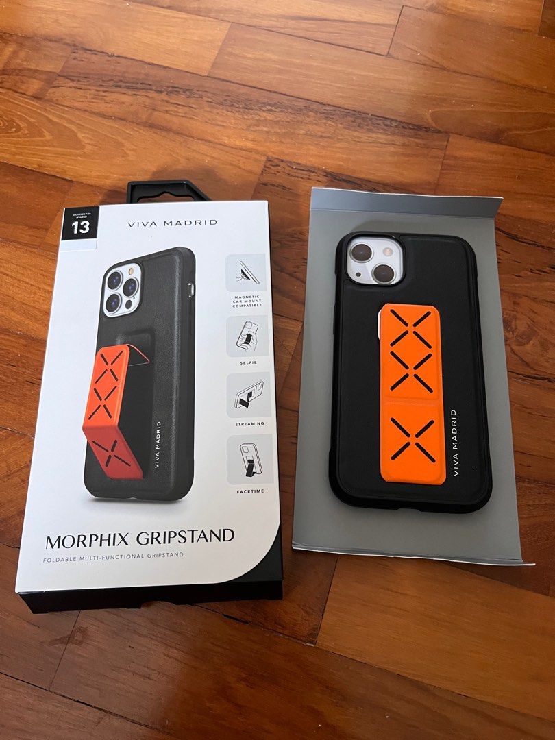 IPhone 13 multi function casing (Category: Cases & Sleeves) located in Singapore. Submitted by busterpiggy (Listing ID 1281048899, Image 1). Description: BRAND NEW iphone 13 multi-function gripstand casing - Black and amber colour combination - Good quality casing.