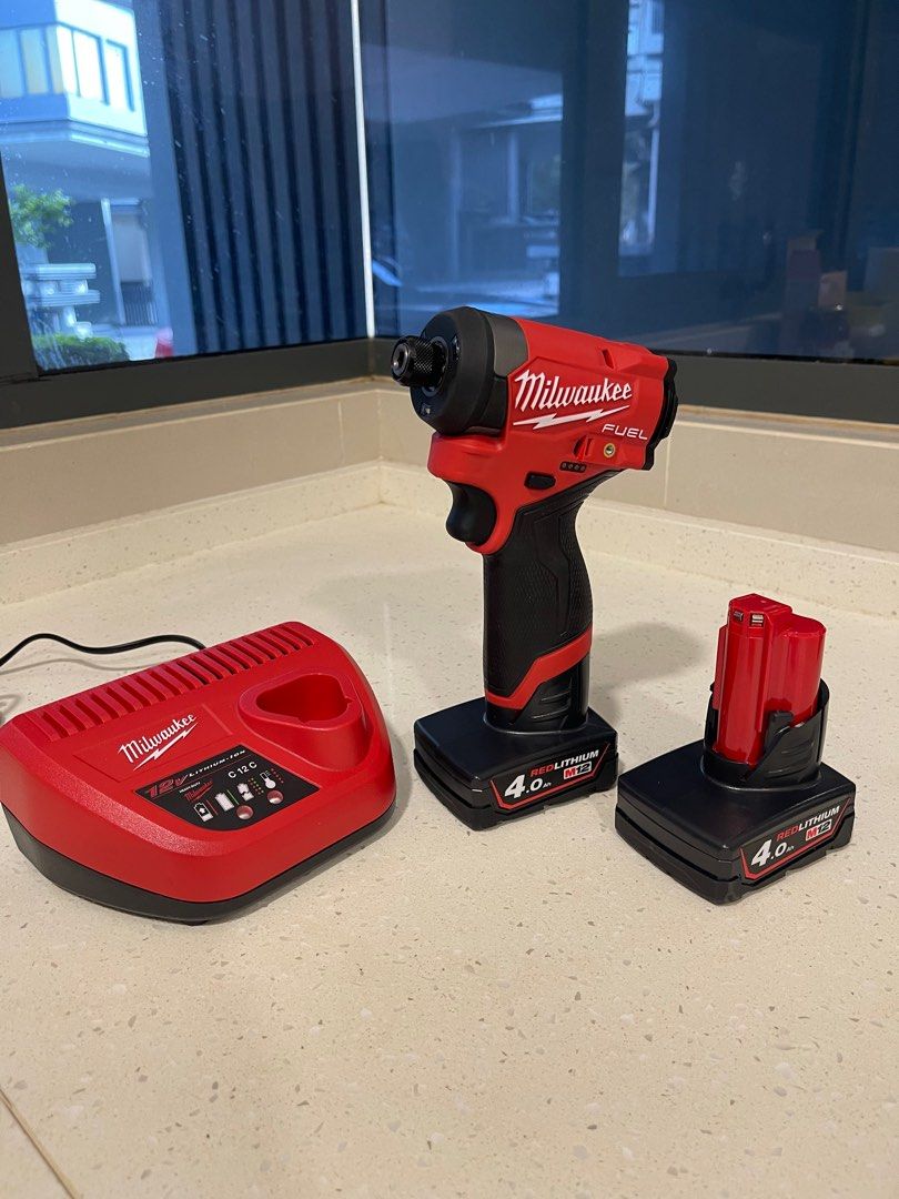 Milwaukee M12 Impact Driver Gen 3 FID2 with battery and charger