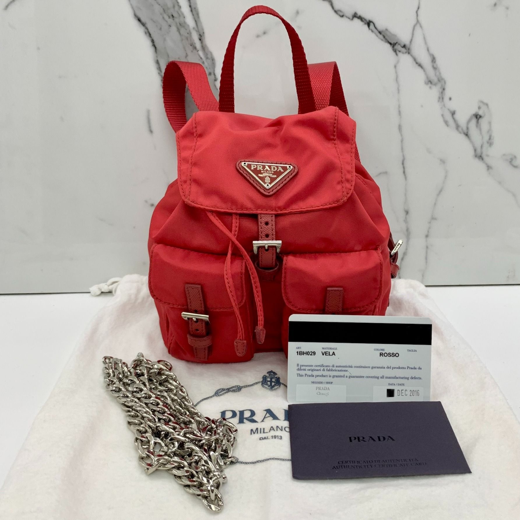 Prada mini chain hotsell backpack