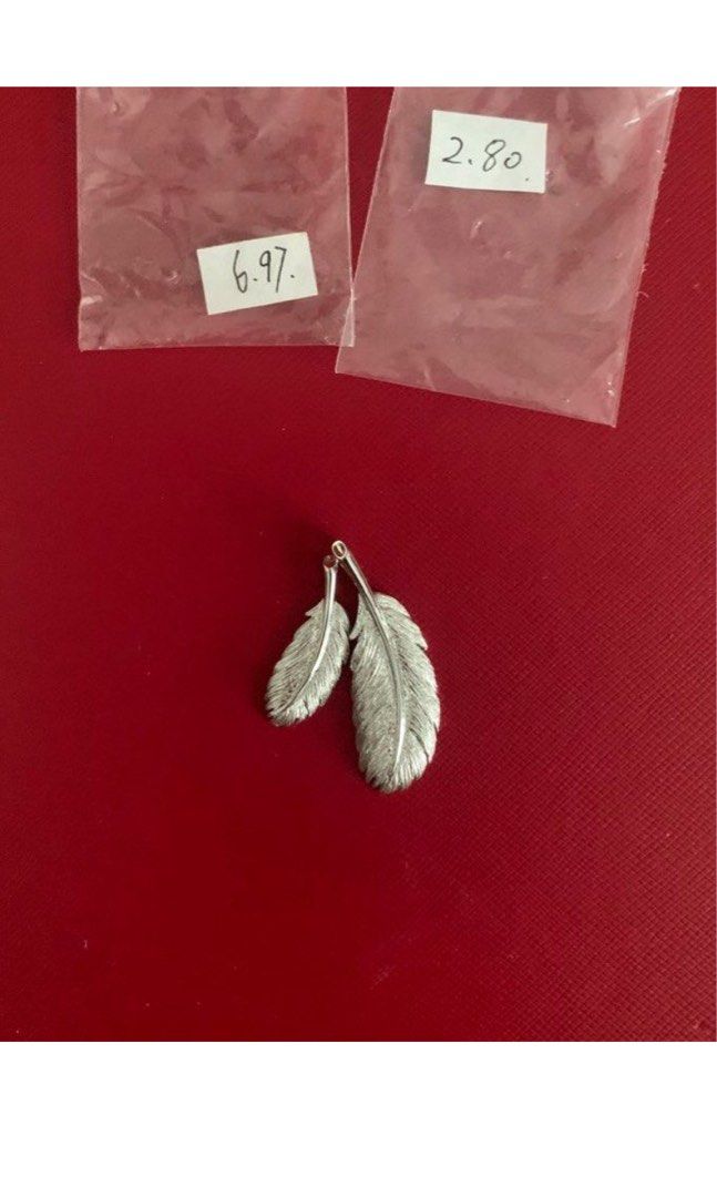 White gold feather pendant best sale