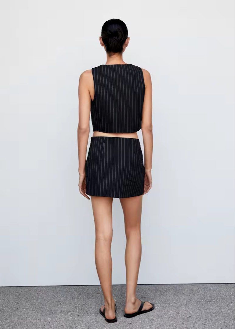 Suit waistcoat & wrap mini skirt (Category: Sets or Coordinates) located in Makati City. Submitted by attybee (Listing ID 1281001841, Image 2). Description: Orig price of top is 1995 Orig price of skirt is 1695 Get Set for 2600.