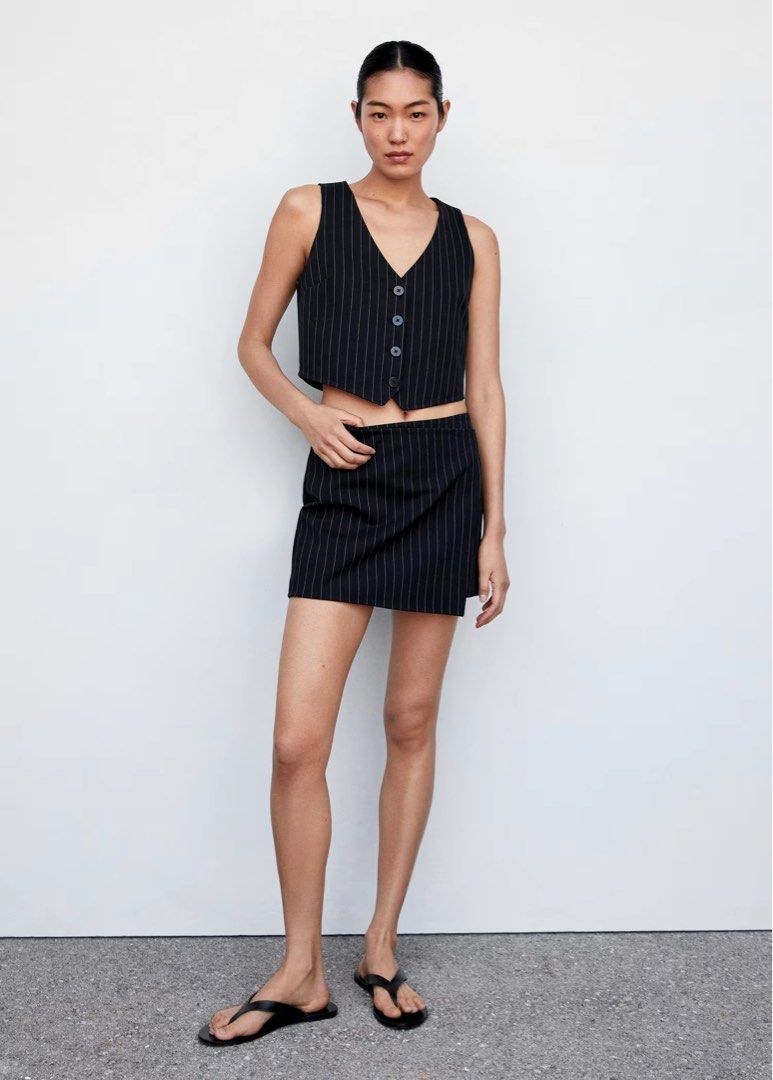 Suit waistcoat & wrap mini skirt (Category: Sets or Coordinates) located in Makati City. Submitted by attybee (Listing ID 1281001841, Image 3). Description: Orig price of top is 1995 Orig price of skirt is 1695 Get Set for 2600.