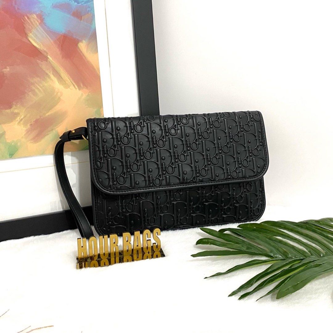 Black on sale dior clutch
