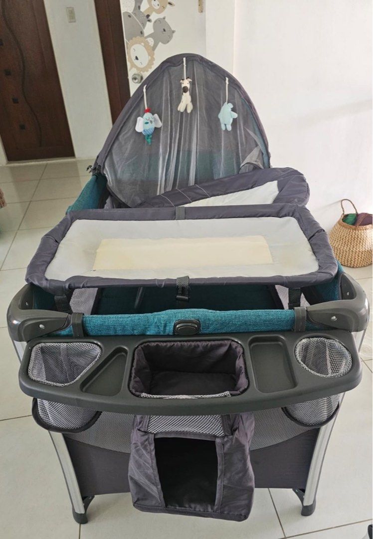 Akeeva Crib to Playpen (Category: Cots & Cribs) located in Antipolo. Submitted by olgarage888 (Listing ID 1281318599, Image 1). Description: Akeeva -Used for only 4 months - Bought for ₱12,000 - With carrier bag - With mosquito net and and toy hood - Day bed -Changing bed -Music box with light vibration -Removable mattress - Organizer caddy - Removable bottom rocker - Shipping fee to be shouldered by buyer.