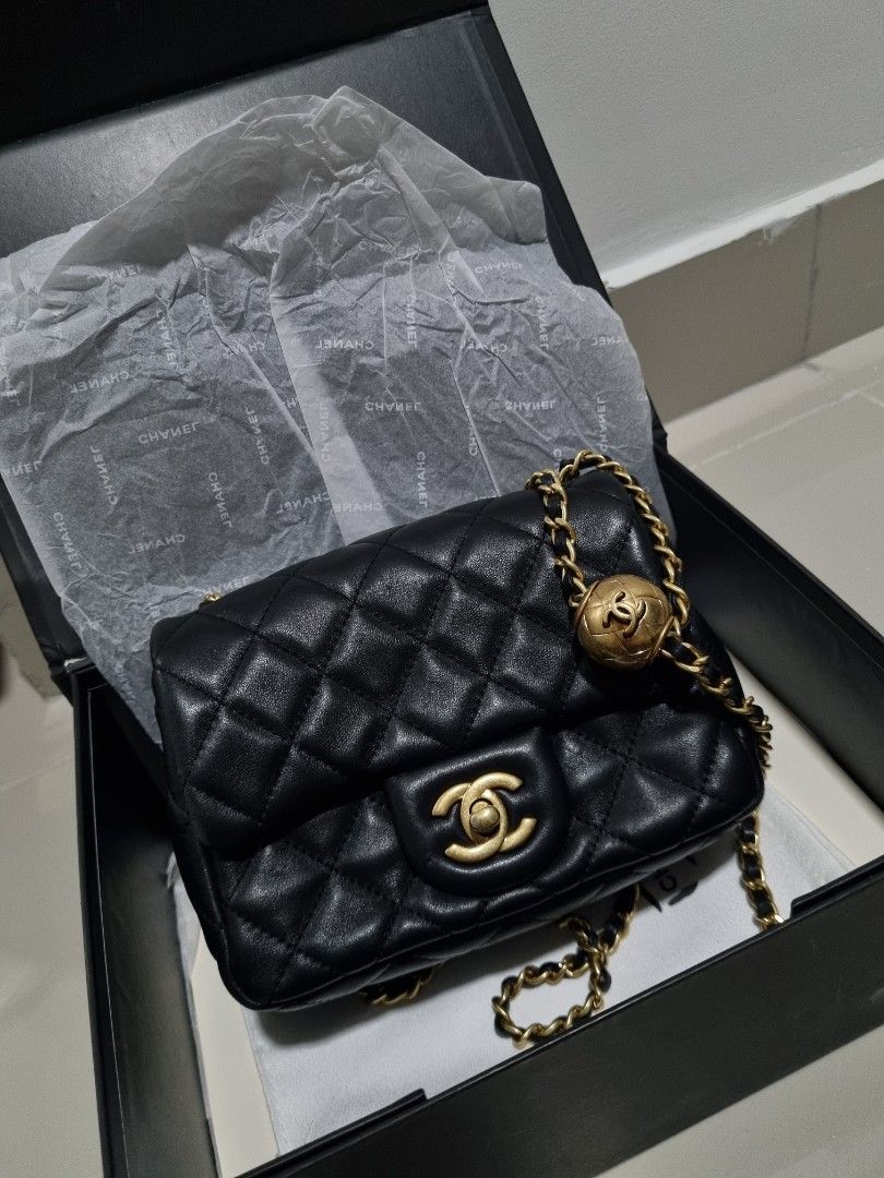 Chanel flap bag with outlet gold ball