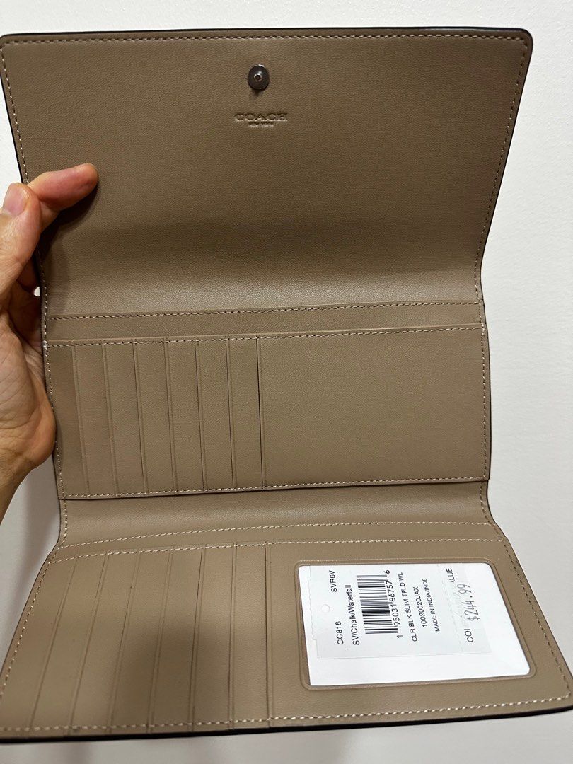 Coach Slim Trifold Wallet (Category: Luxury Bags & Wallets) located in Quezon City. Submitted by qeilahh (Listing ID 1269893802, Image 2). Description: Bought directly from Coach Outlet Website Made from pebbled leather.