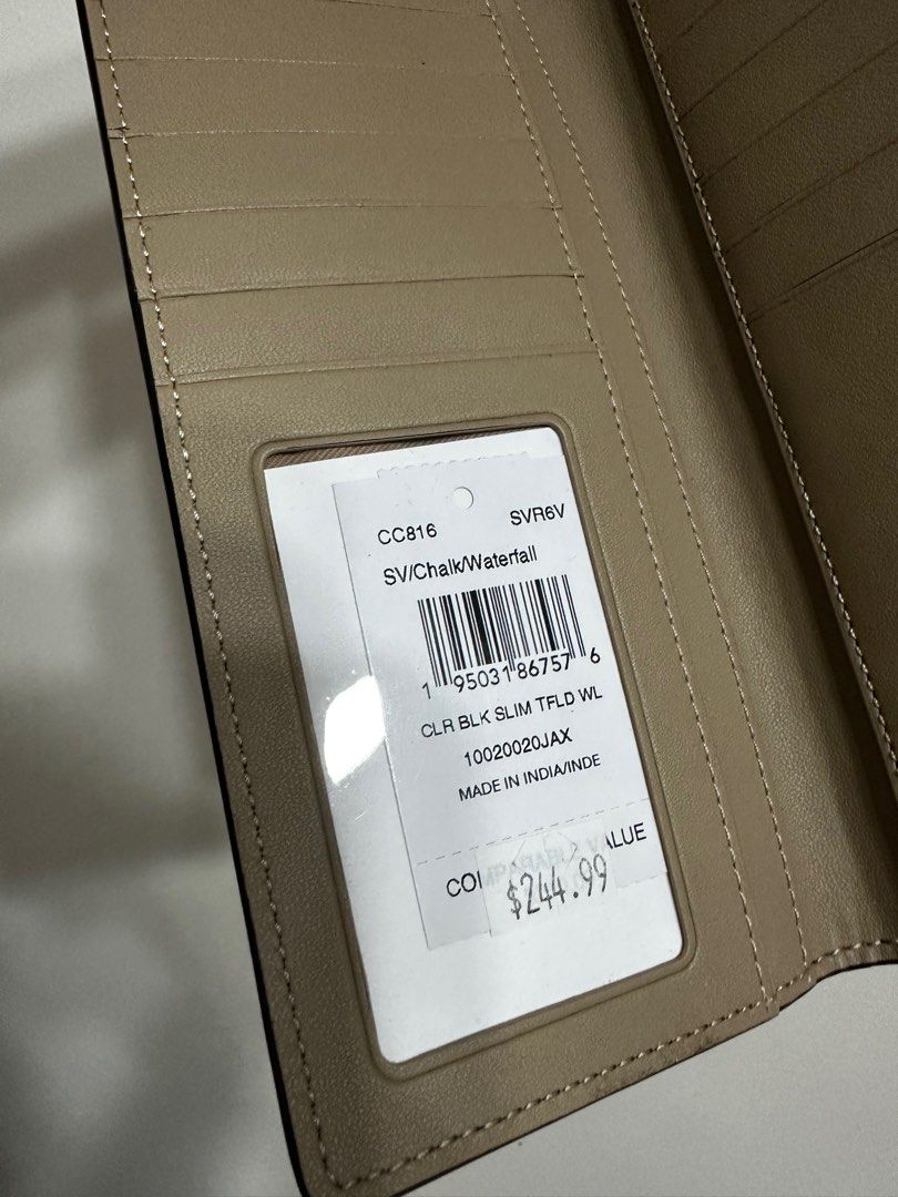 Coach Slim Trifold Wallet (Category: Luxury Bags & Wallets) located in Quezon City. Submitted by qeilahh (Listing ID 1269893802, Image 3). Description: Bought directly from Coach Outlet Website Made from pebbled leather.