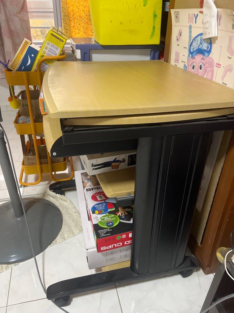 Computer table (Category: Tables & Sets) located in Singapore. Submitted by sarahxsu (Listing ID 1281340154, Image 2). Description: Hardly used. With wheels, all working well. Solid wood. Please arrange your own delivery. .