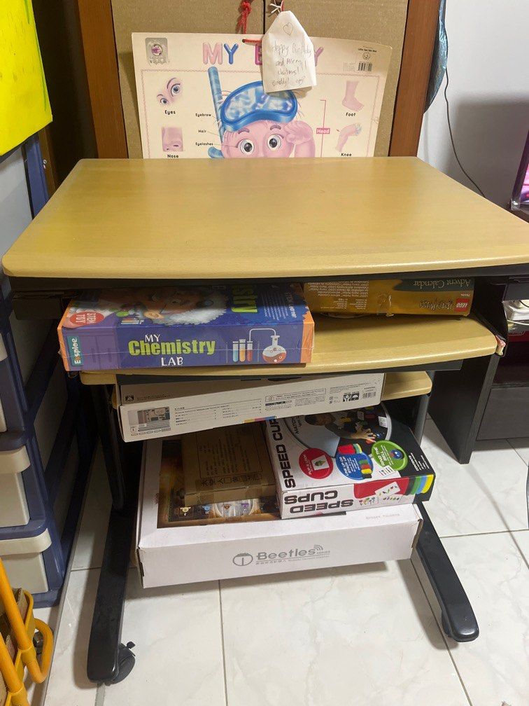 Computer table (Category: Tables & Sets) located in Singapore. Submitted by sarahxsu (Listing ID 1281340154, Image 3). Description: Hardly used. With wheels, all working well. Solid wood. Please arrange your own delivery. .