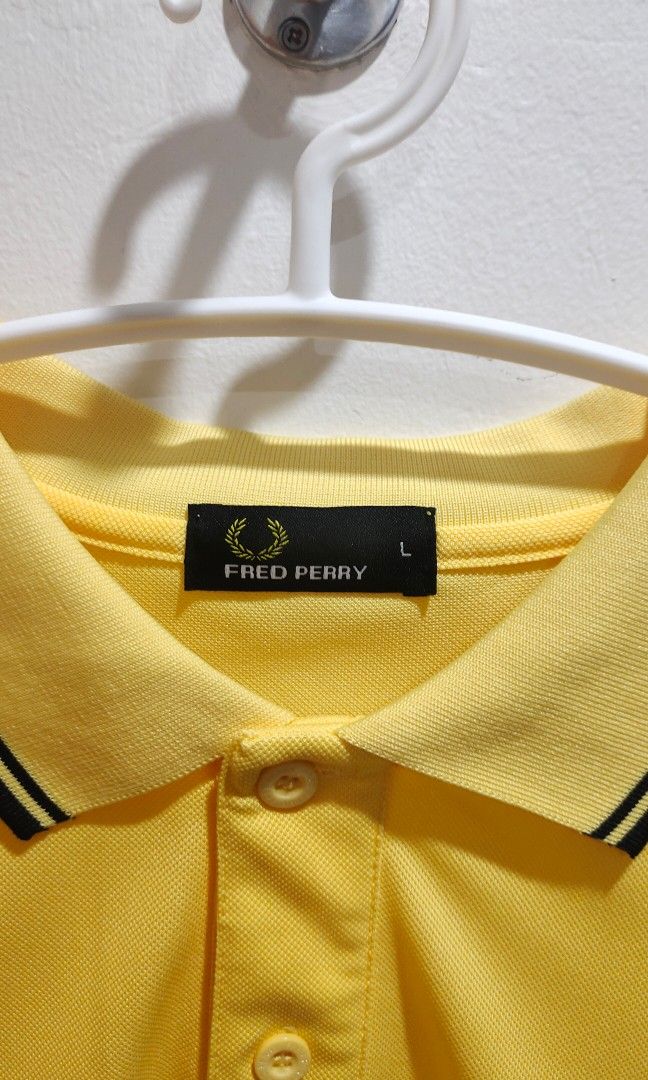 Fred Perry (Category: Tshirts & Polo Shirts ) located in Quezon City. Submitted by methodstudios (Listing ID 1281401463, Image 2). Description: good quality Original price 350 length 29.5 arms 12" neck 6.5" chest 16.5" shoulder 17.5".