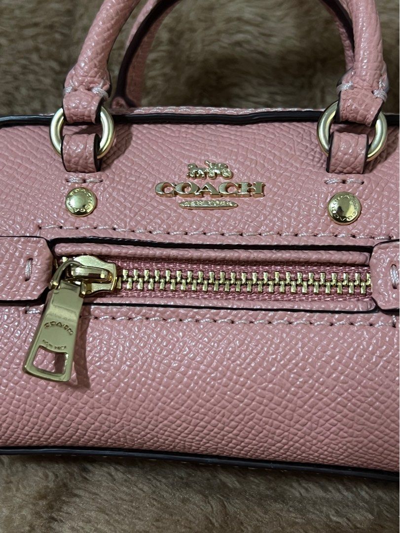 Original Coach Mini Bag charm in Pink (Category: Luxury Bags & Wallets) located in Quezon City. Submitted by ynahcherwin (Listing ID 1268974606, Image 2). Description: Almost new / Barely used Authentic / Original Coach Mini Bag Charm Pink Can be used as Coin purse, Card Case, Wallet, etc. PM me if you want to see more pictures 😊.