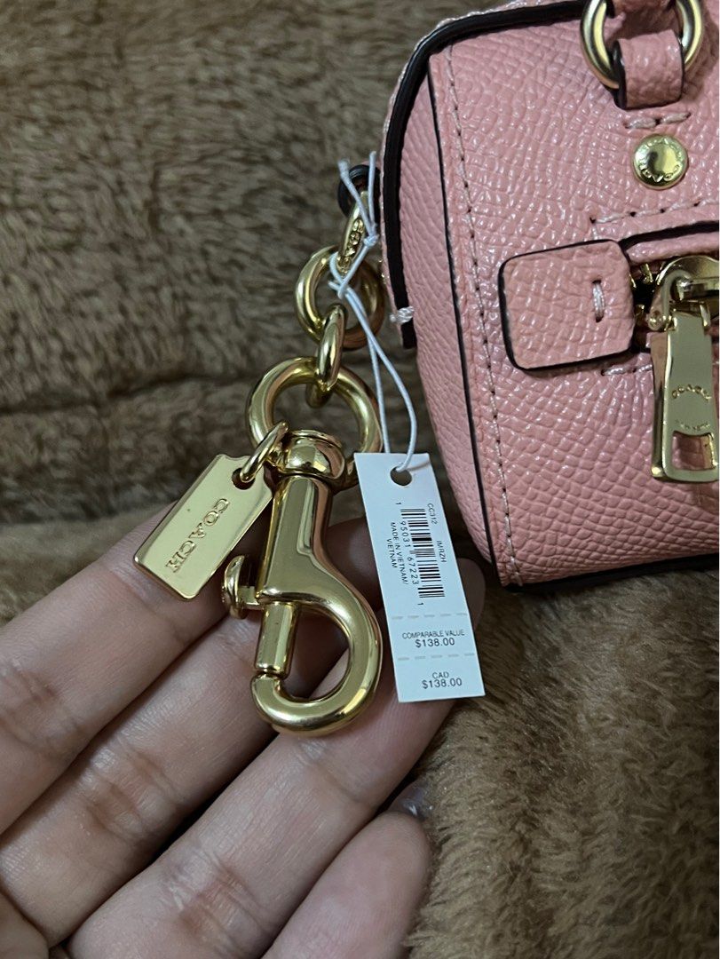 Original Coach Mini Bag charm in Pink (Category: Luxury Bags & Wallets) located in Quezon City. Submitted by ynahcherwin (Listing ID 1268974606, Image 3). Description: Almost new / Barely used Authentic / Original Coach Mini Bag Charm Pink Can be used as Coin purse, Card Case, Wallet, etc. PM me if you want to see more pictures 😊.
