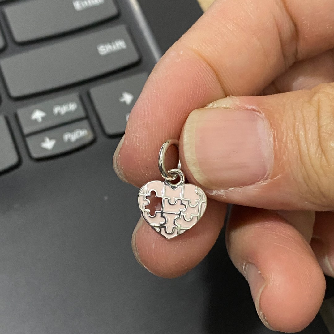 Puzzle pandora charm best sale