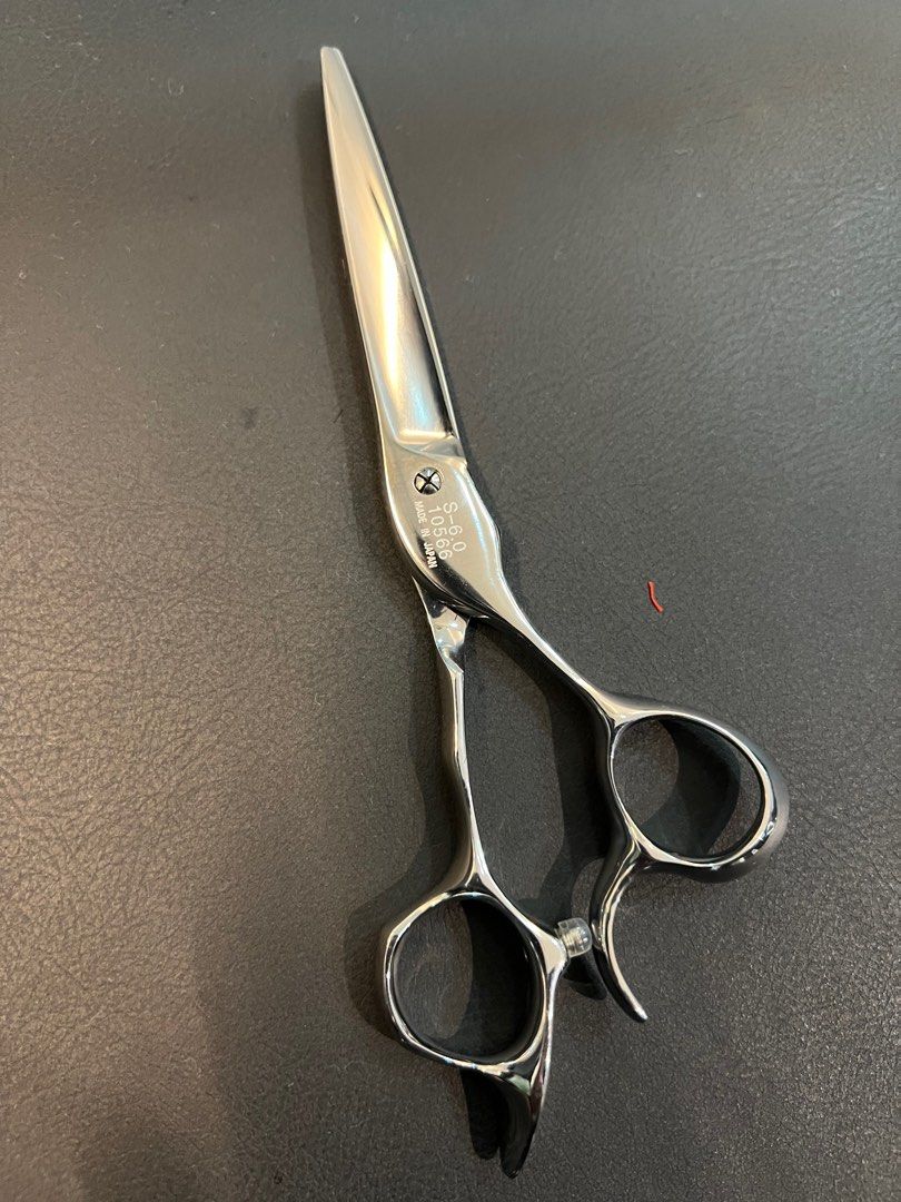 Scissors (Category: Hair Accessories) located in Singapore. Submitted by jae_boutique (Listing ID 1281384772, Image 2). Description: Not sure Authentic onot because I purchased from friend around $600+ and for sure scissors is very sharp and accurate Seldom use: just let go and want upgrade 5.5inchces.