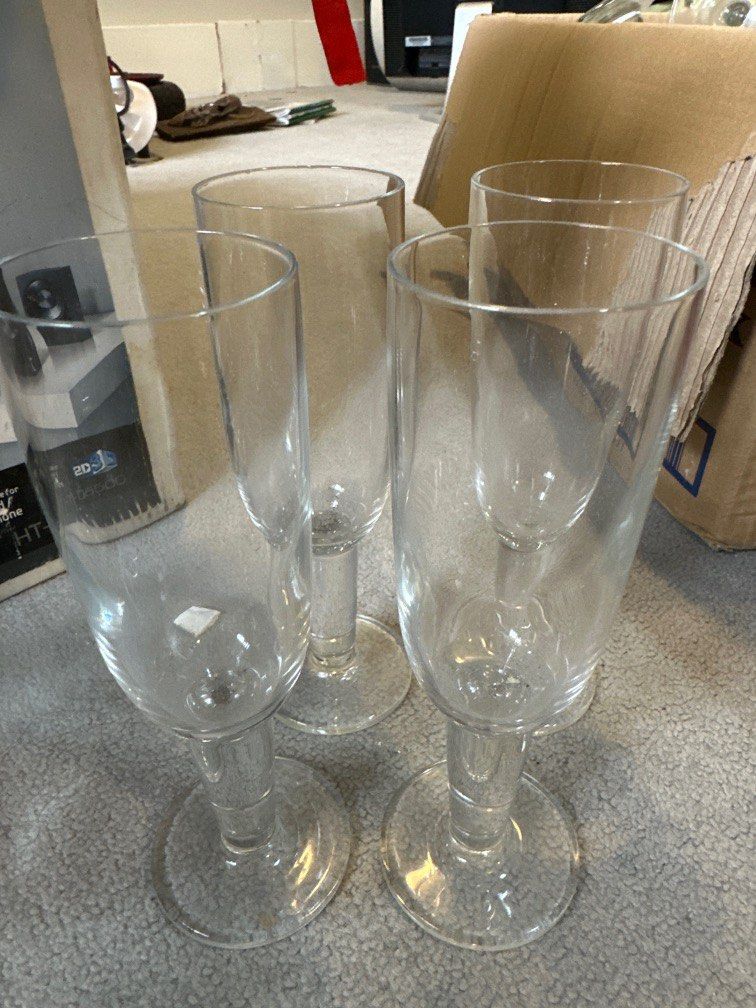 Set of 4 flute glasses (Category: Other Kitchenware & Tableware) located in Muntinlupa City. Submitted by miqs171012 (Listing ID 1281304779, Image 1). Description: Old but never used No damages.
