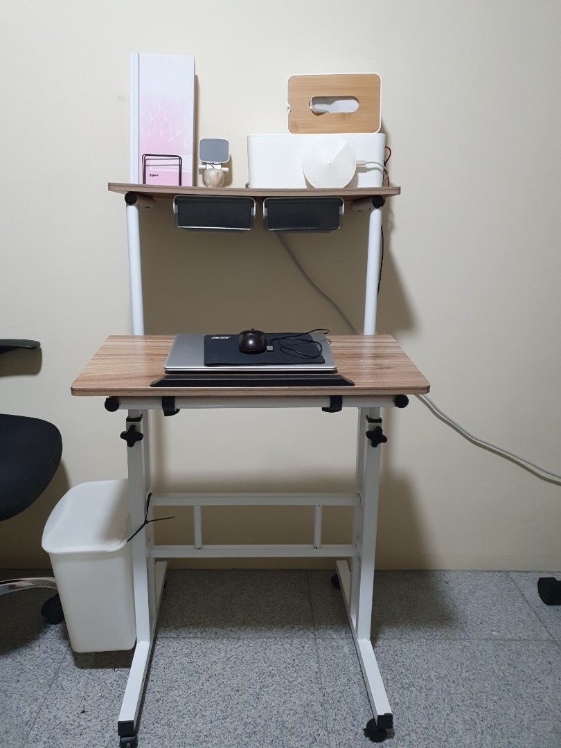 Study Table (Category: Other Home Furniture) located in Singapore. Submitted by BabyChako (Listing ID 1281348714, Image 1). Description: Adjustable height study table with 2 attached drawers. *please referred to second pics, the plank slightly curved . OR Trade. Please arrange own transport..