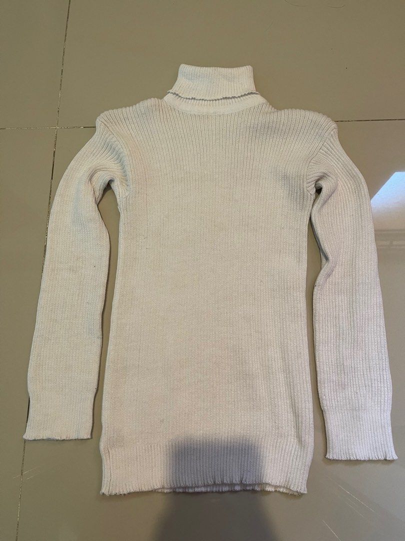 White knitted turtleneck