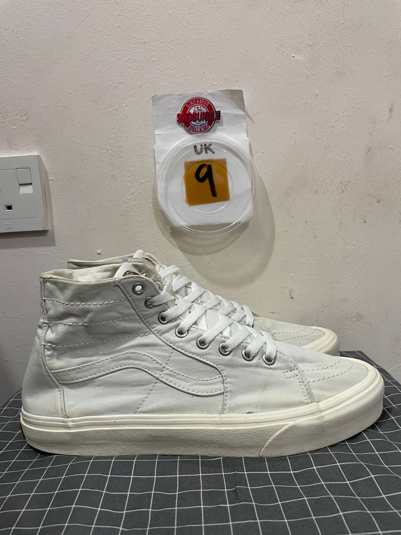 Triple white high top vans top