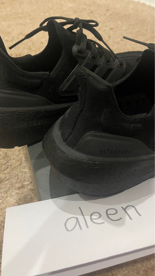 Adidas ultra boost store triple black qasa