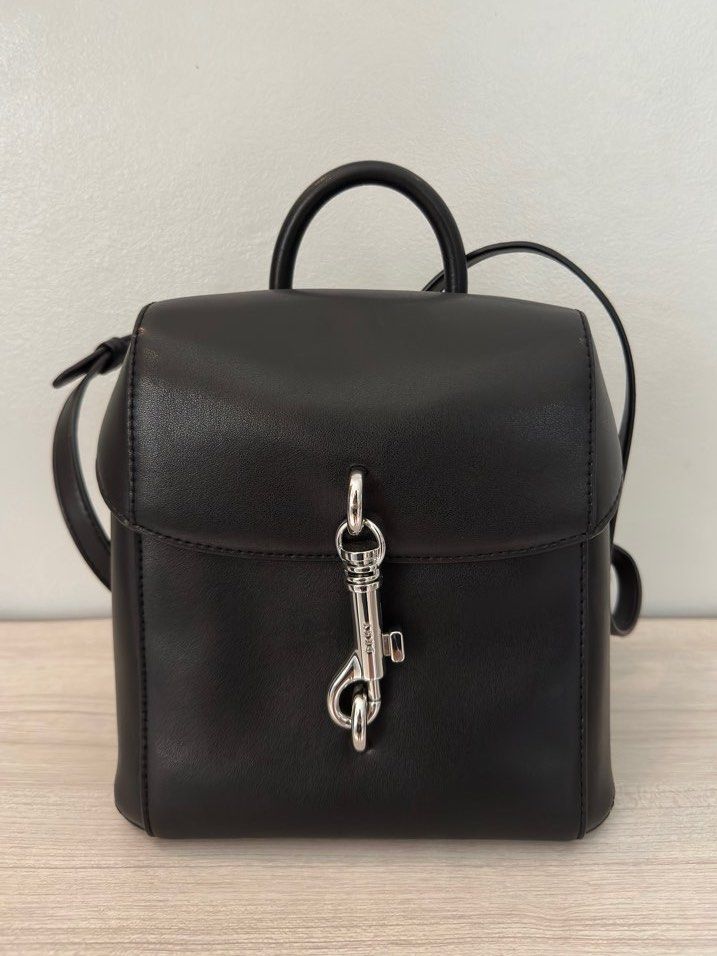 DKNY Mini Leather Backpack (Category: Luxury Bags & Wallets) located in Paranaque City. Submitted by outfit.repeater (Listing ID 1281499110, Image 1). Description: Authentic DKNY Women’s Ink Leather Mini Backpack Black | Silver-tone exterior hardwares Product Details: 8” width x 8”height x 4-1/2”depth lock closure | 1 interior zip pocket and 1 open pocket can fit a tablet (size 8”-10”) Comes with its original dust bag .
