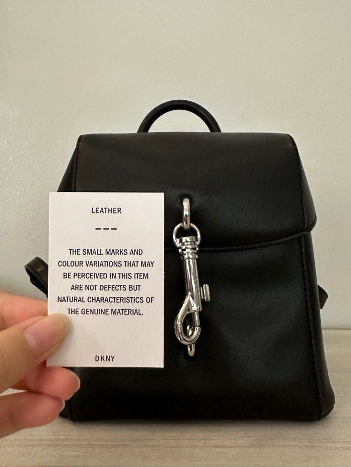 DKNY Mini Leather Backpack (Category: Luxury Bags & Wallets) located in Paranaque City. Submitted by outfit.repeater (Listing ID 1281499110, Image 3). Description: Authentic DKNY Women’s Ink Leather Mini Backpack Black | Silver-tone exterior hardwares Product Details: 8” width x 8”height x 4-1/2”depth lock closure | 1 interior zip pocket and 1 open pocket can fit a tablet (size 8”-10”) Comes with its original dust bag .