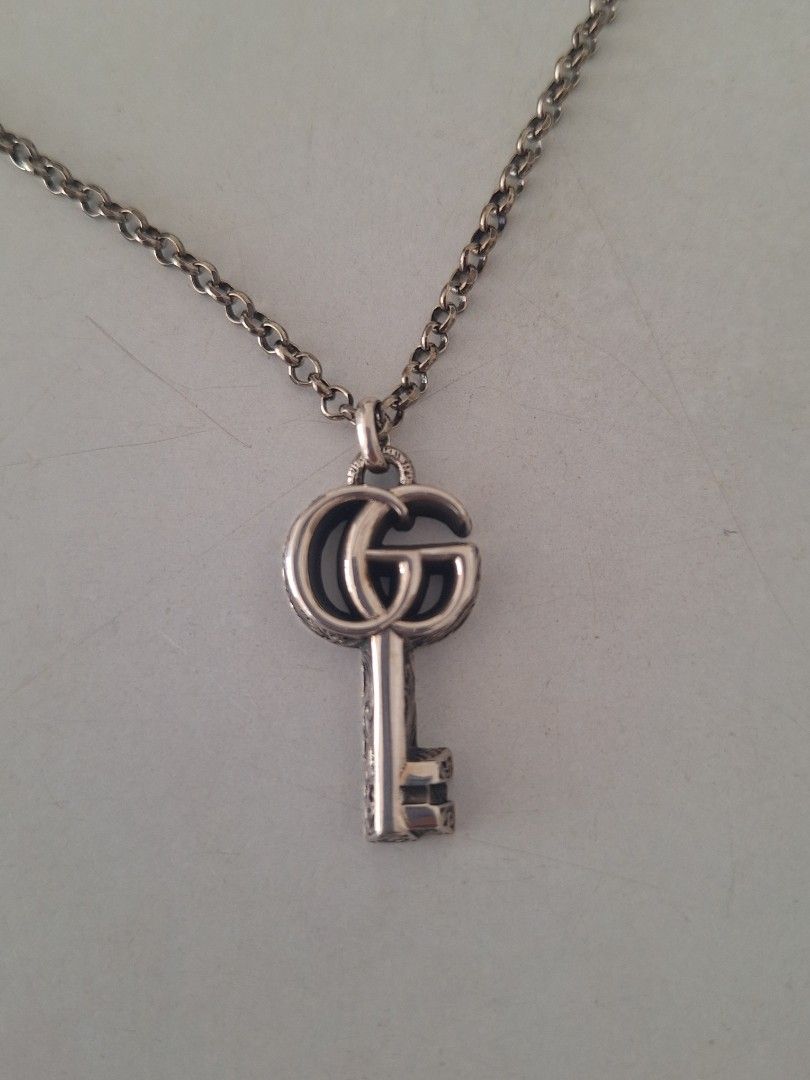 Real discount gucci pendant