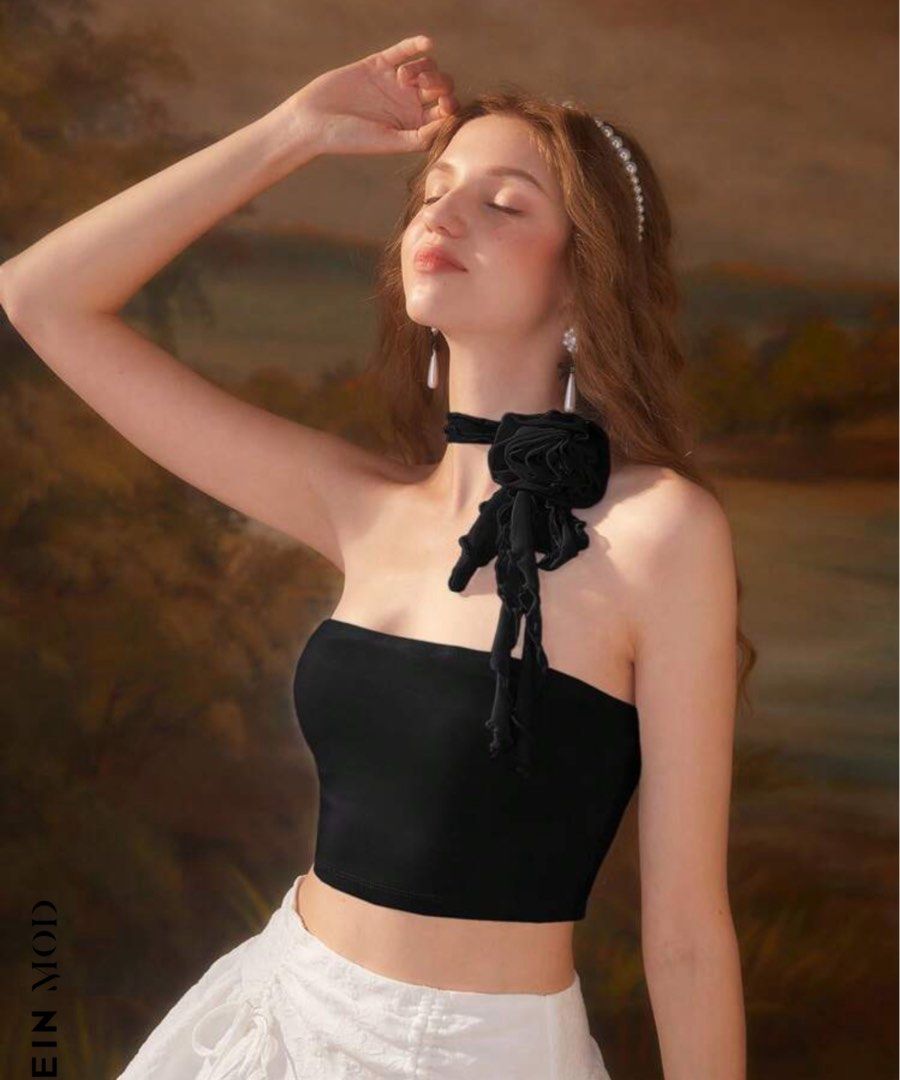 Black halter top (Category: Sleeveless) located in Quezon City. Submitted by declutter_A (Listing ID 1281510489, Image 2). Description: once used super cute.