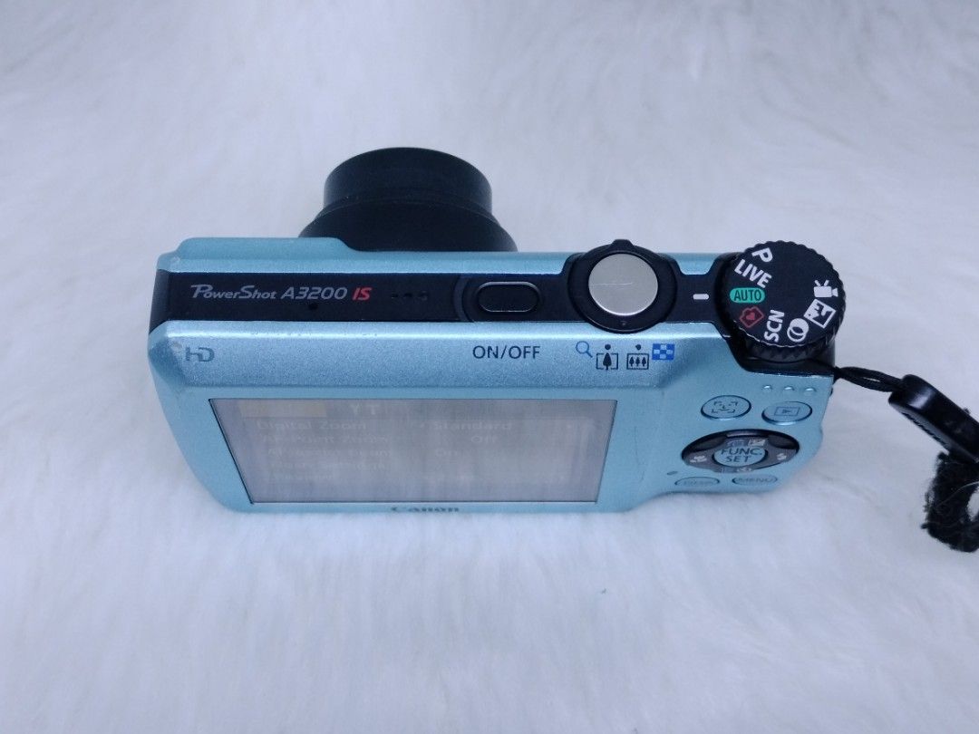 canon powershot a3200IS (Category: Cameras) located in Manila. Submitted by ultimogizmos (Listing ID 1281562658, Image 3). Description: Canon PowerShot A3200 14.1MP Point-and-Shoot Digital Camera (Blue) Description Product Description New modes like the Toy Camera and Monochrome Effects further extend your creative reach while 14.1 megapixel resolution, a 28mm wide-angle lens and a 5x optical zoom with Optical Image Stabilizer ensure that every s