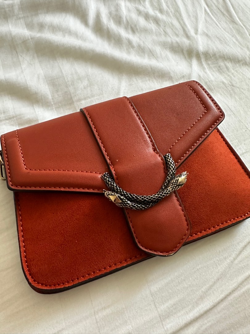 Sela snake outlet cross body bag