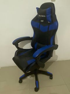 Gaming chair with massager