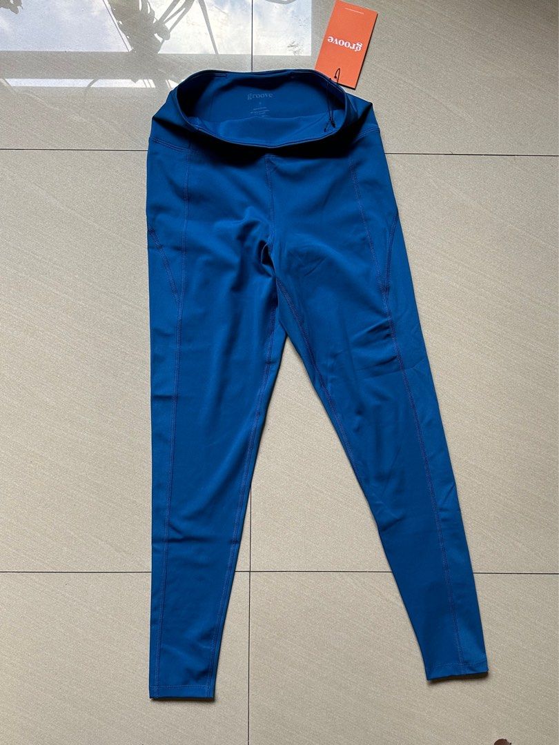 Groove Activewear Basic Compression Tights Leggings in Blueberry (Small) (Category: Activewear) located in Pasig City. Submitted by Bbbb123 (Listing ID 1281516759, Image 3). Description: BNWT SRP: ₱2,695.00 Our price: Less than ₱695.00 Size chart in photos Helping tags: Girlfriend Collective Gymshark Alo Yoga Lululemon Nike Adidas.