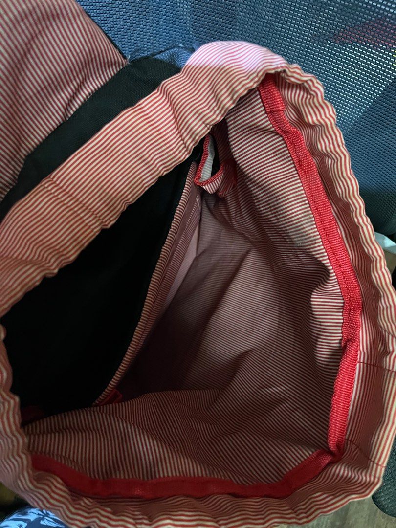 Hershel Backpack (Category: Backpacks) located in Singapore. Submitted by pixelandcam (Listing ID 1281609532, Image 2). Description: Got it as a gift. Have newer bags now so want to clear this. The part with the string, can’t be tighten as it fell out so it was replaced with a shoelace to tighten the bag. Still looks great on the outside and able to use and fully functions. .