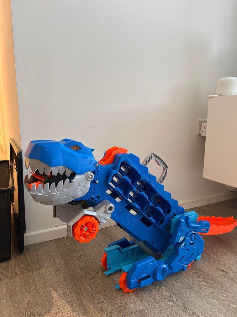 Hot Wheels City Ultimate Hauler, Transforms Into A TRex, Hobbies & Toys, Toys & Games on Carousell
