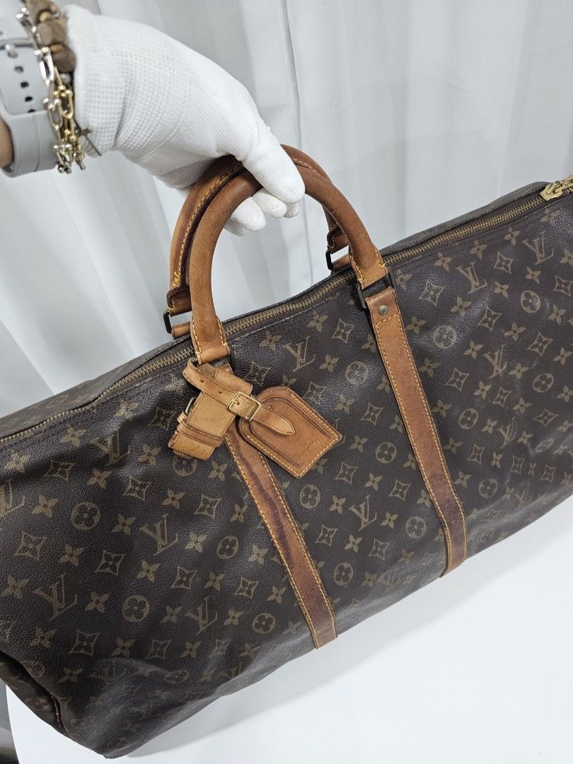 🧡Louis Vuitton Keepall 60 (Category: Luxury Bags & Wallets) located in Las Pinas. Submitted by mybagsfromthepast (Listing ID 1281452280, Image 3). Description: Louis Vuitton Keepall 60 Perfect bag to carry on board or anywhere with style. Exterior Canvas: In very good condition. No rubs or tear. Very clean Vachetta Leather/Trimmings: Show signs of wear and aging. With cracks but still intact, Dark patina, Watermarks Hardware: Partially tarnished