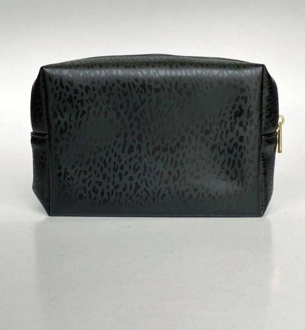 ORIGINAL YSL COSMETIC POUCH (Category: Luxury Bags & Wallets) located in Iligan City. Submitted by sosyalistascloset (Listing ID 1281589036, Image 2). Description: Like New Never been used YSL pouch.