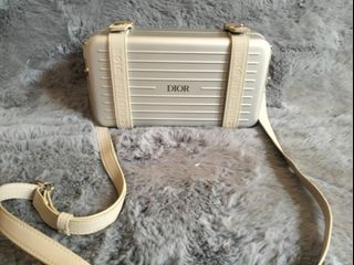 Dior rimowa clutch price singapore sale