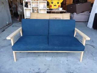Solid wood and fabric sofa 53L x 26W x 15H seat height inches Sandalan height 27 inches In good condition