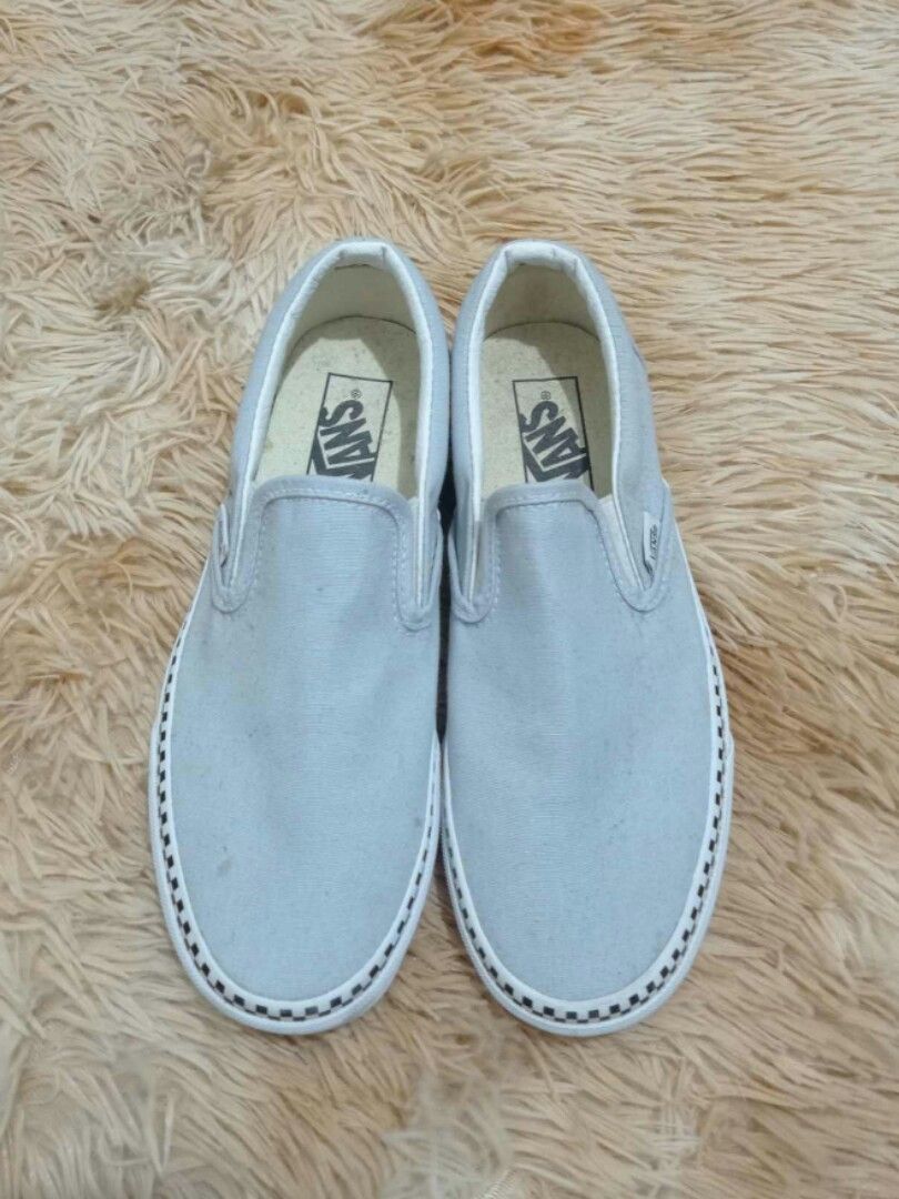 Light blue vans store with checkered rim