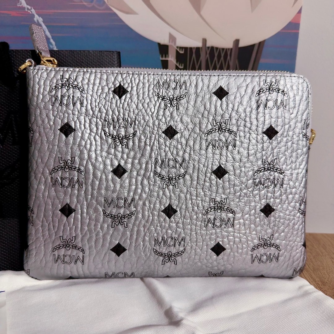 Mcm clutch sale discount