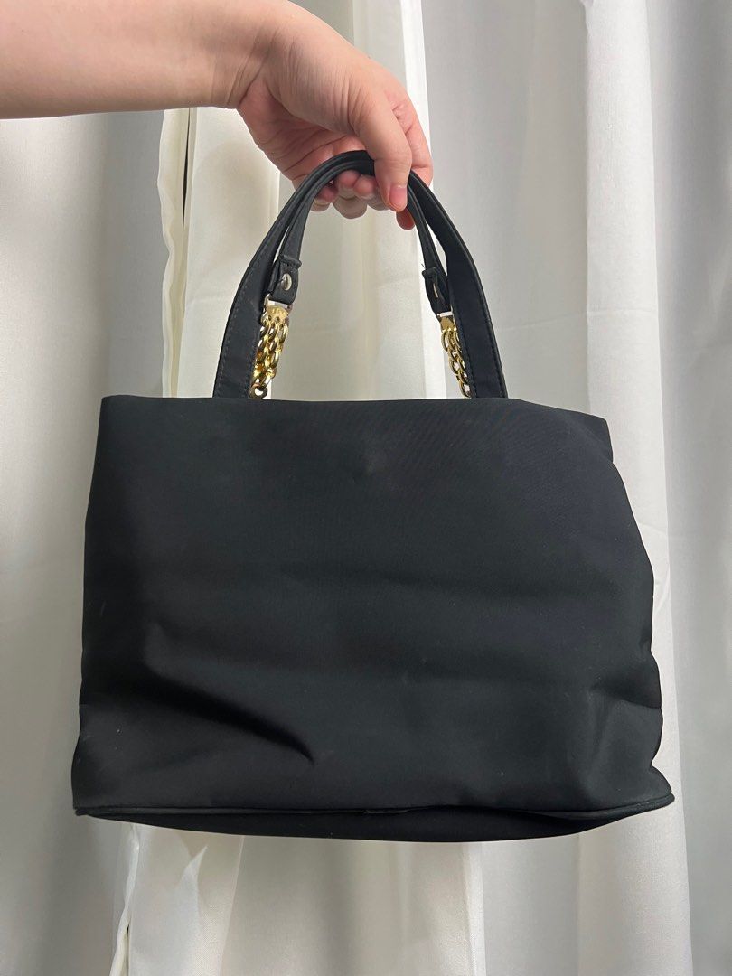 Anna Cristina Firenze Black Nylon Handbag (Category: Luxury Bags & Wallets) located in Manila. Submitted by bin-teji (Listing ID 1281748538, Image 2). Description: Anna Cristina Firenze Black Nylon Handbag 100% Legit Rank AB—In very good condition No sling included .