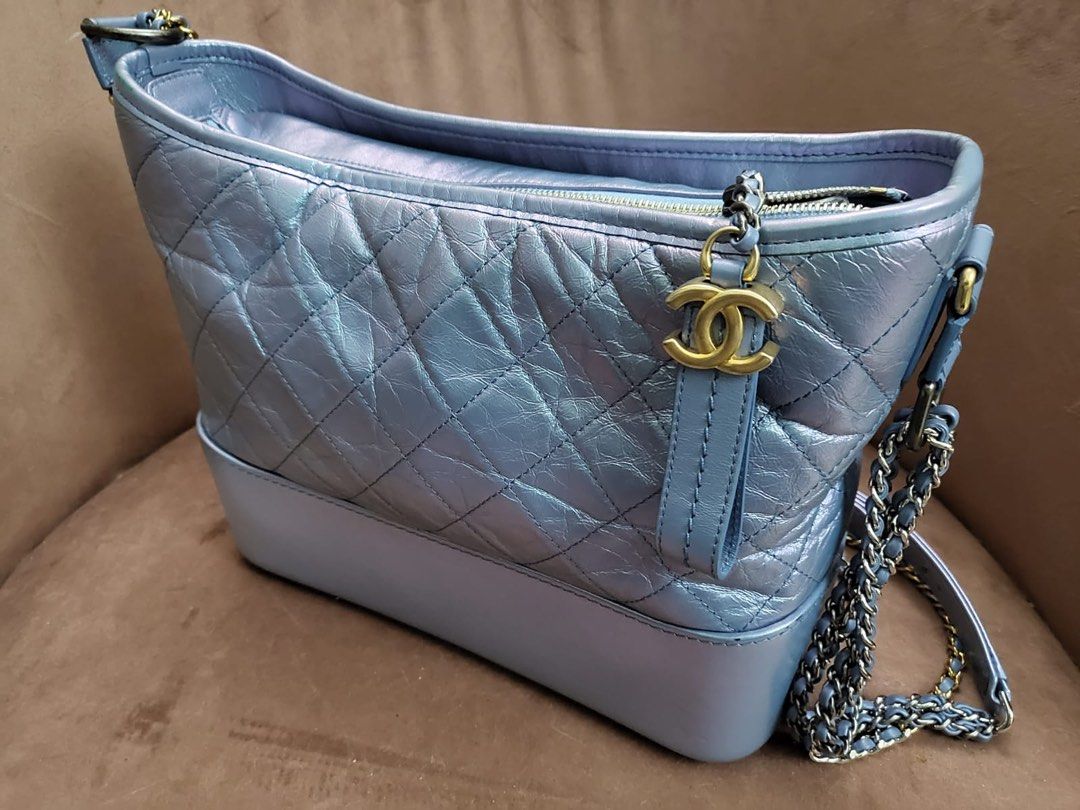Authentic Chanel Gabrielle Medium Size (On Sale - Layaway Ready) (Category: Luxury Bags & Wallets) located in Rizal. Submitted by SummerPeaCloset (Listing ID 1281801042, Image 1). Description: With original dustbag Series 28 Light Blue Shimmer Aged Leather Rare find ❤️ In good condition Selling low for Php 170,000 With slight imperfection (on one side) as shown on the last photo, hence lowered price (can easily be retouched) #2024declutter.