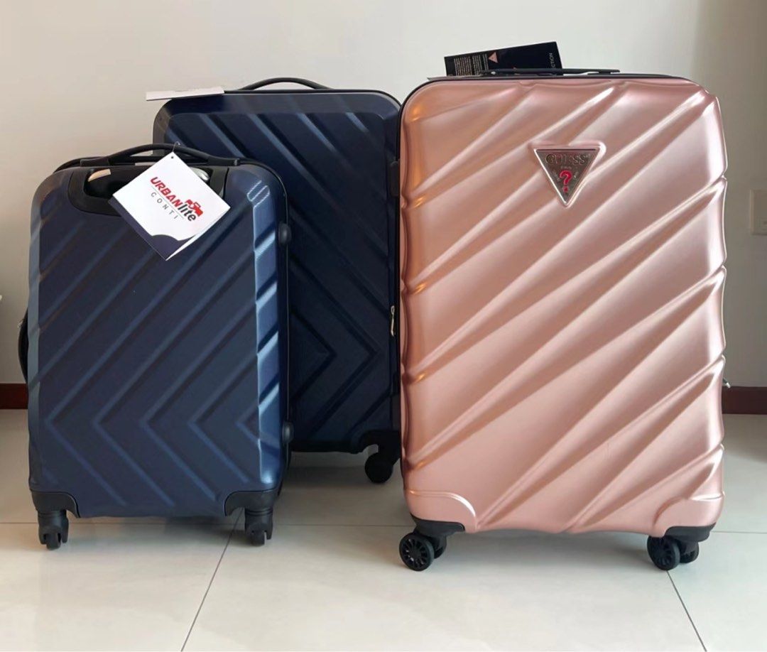 GUESS luggage 24 Rose Gold Brand New