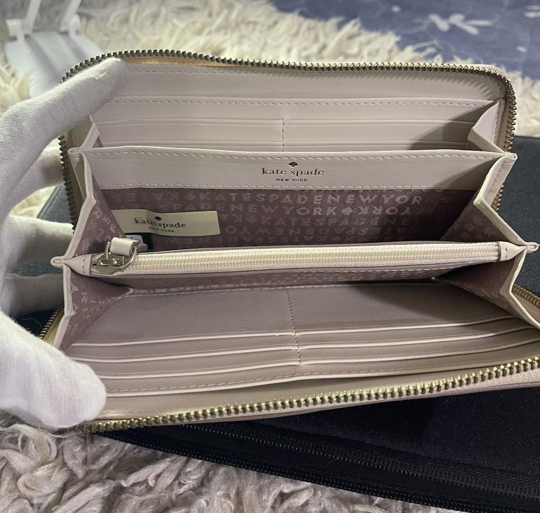 Kate Spade Ella Large Continental Wallet (Category: Luxury Bags & Wallets) located in Dagupan City. Submitted by japanorigitems (Listing ID 1281648239, Image 2). Description: Kate Spade Ella Large Continental Wallet like new condition.