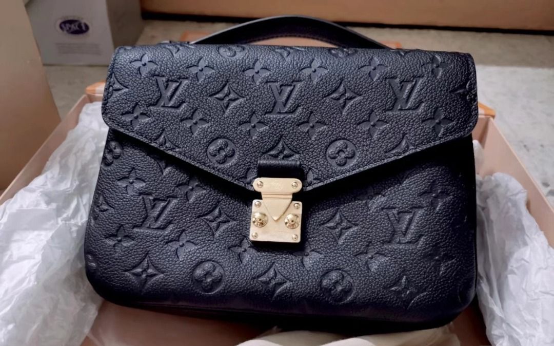 Pochette metis empreinte online noir