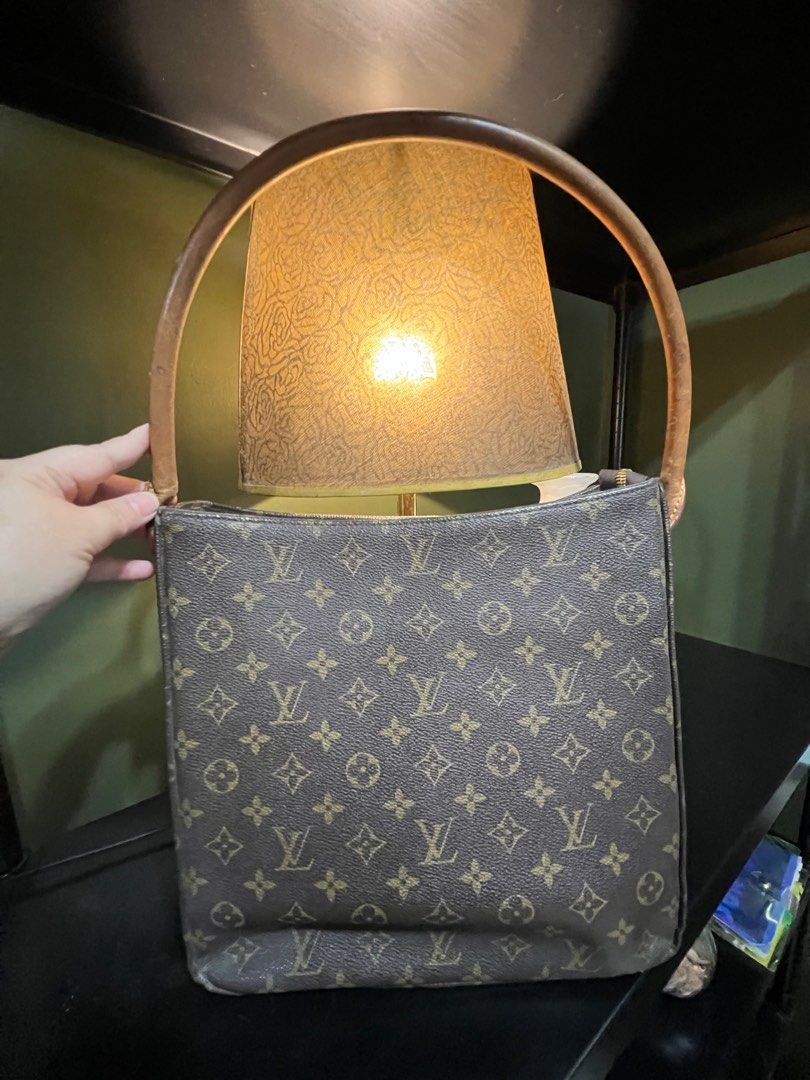 LV Looping Shoulder (Category: Luxury Bags & Wallets) located in Pasig City. Submitted by home.declutters (Listing ID 1281695027, Image 1). Description: Pasalubong from a friend from Japan, 2nd hand sya.