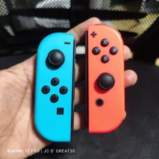 Nintendo Switch Joycon Neon blue and red Original