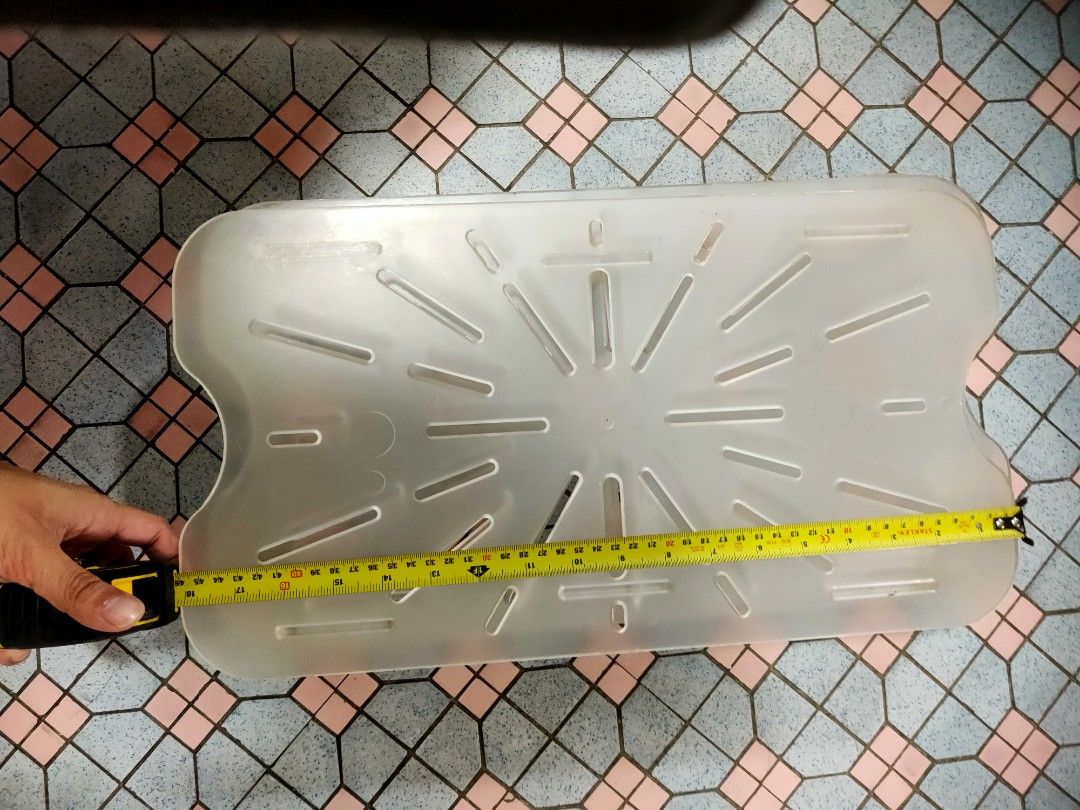 Plastic insert drainer (Category: Food Organisation & Storage) located in Singapore. Submitted by steeveets (Listing ID 1281667839, Image 3). Description: Drainer for full insert. 25x46.