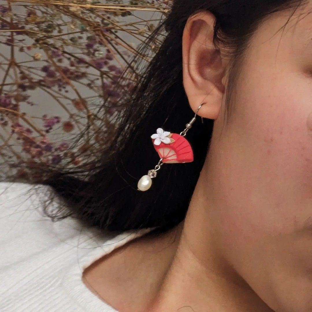 Red pierced deals earrings